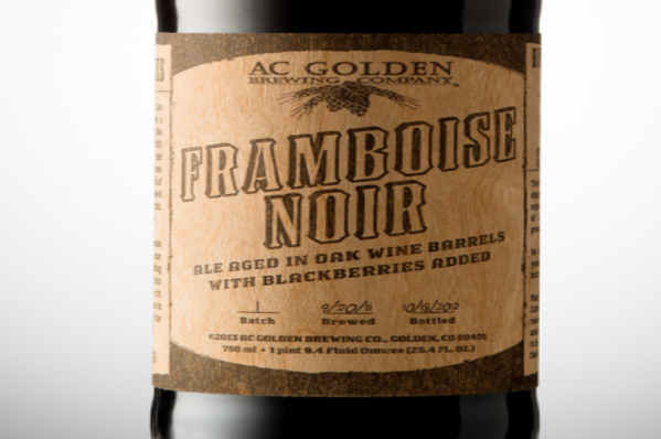Framboise Noir beer aged in oak wine barrels, from AC Golden Brewery, uses wood veneer labels