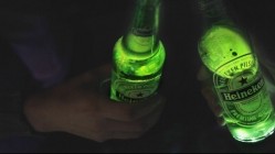 Heineken Ignite glows after bottles are clinked together