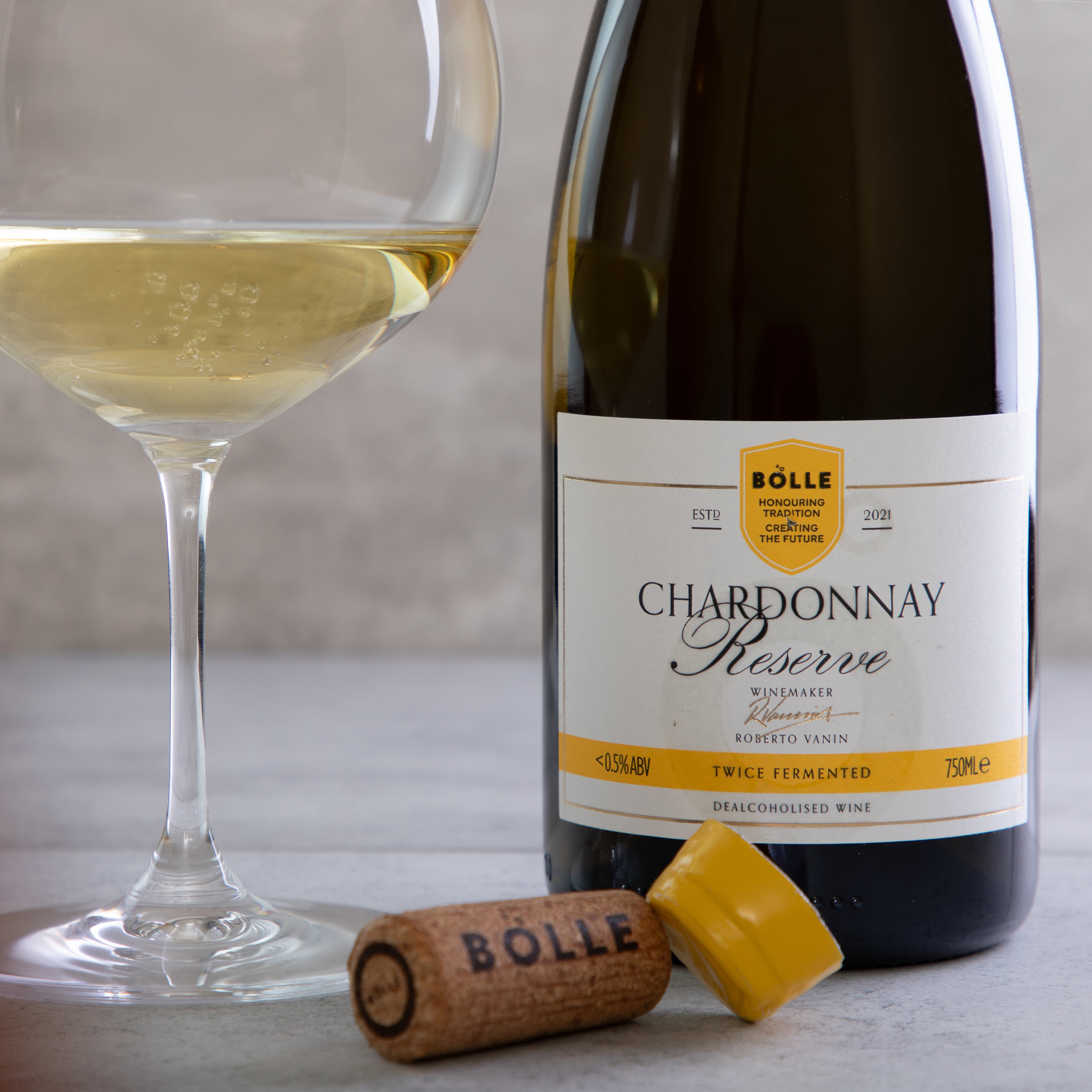 Bottle of BOLLE Chardonnay Reserve alcohol-free wine with pale gold appearance.