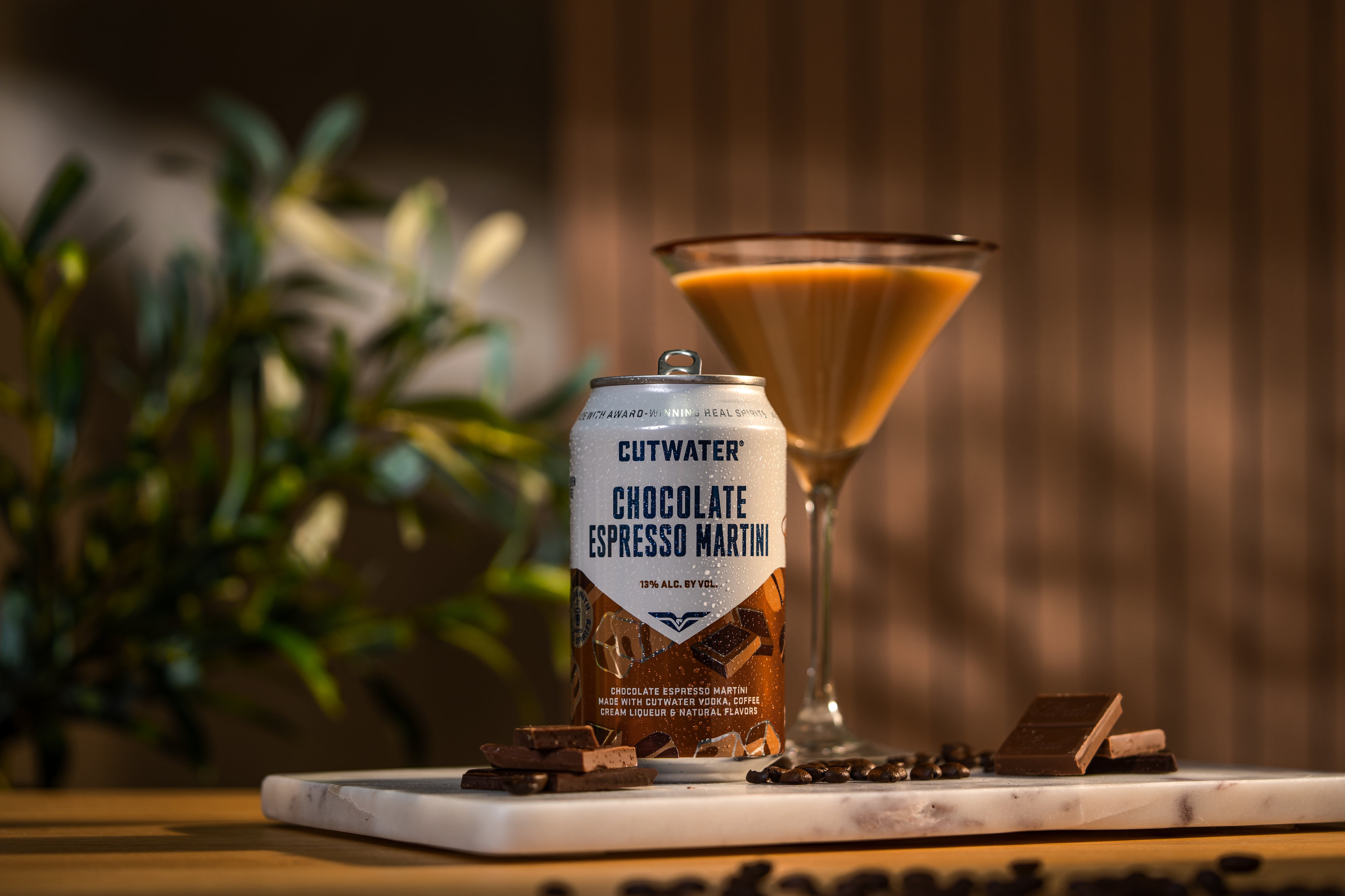 Cutwater Chocolate Espresso Martini can with cocktail serve and garnish.