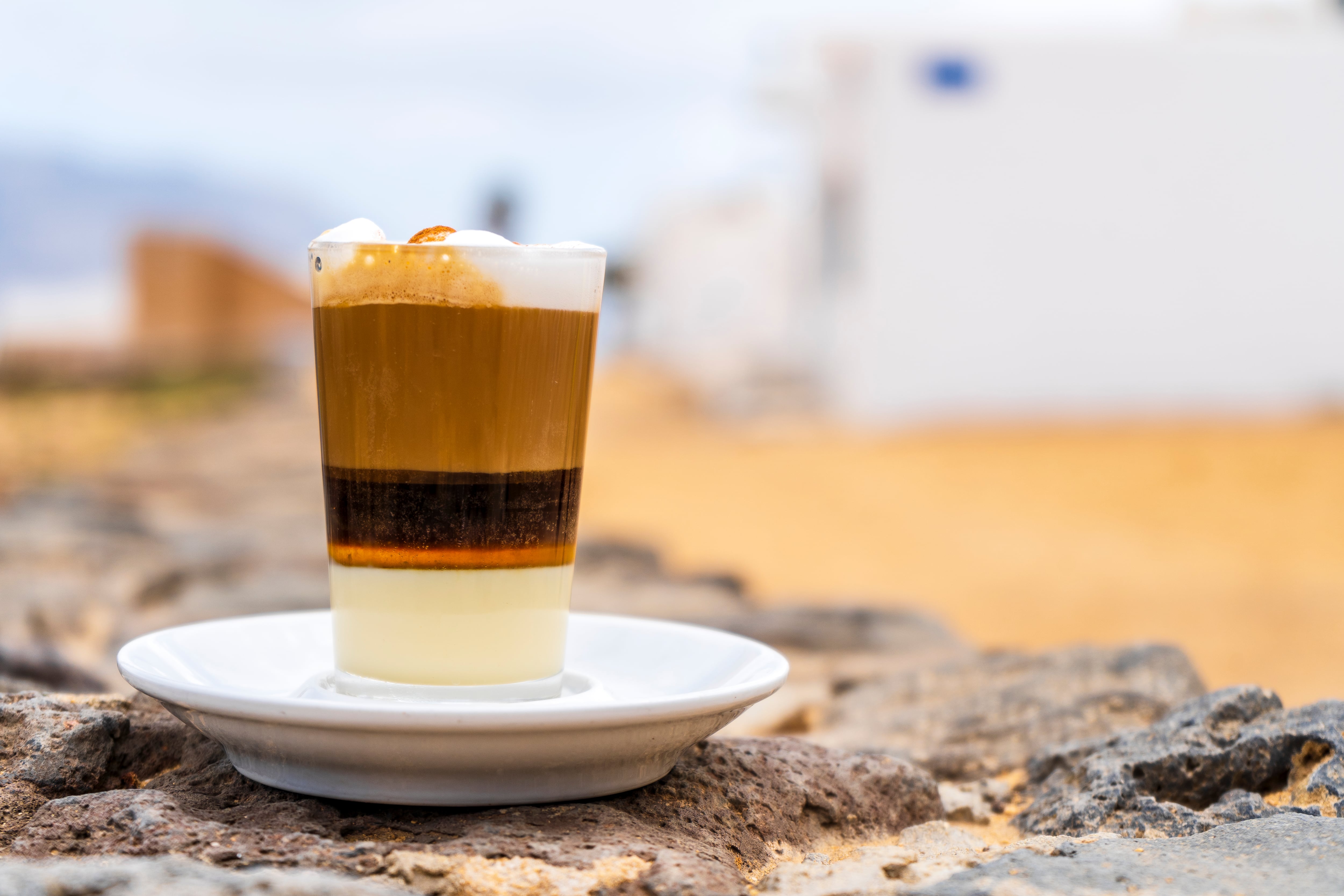 Delicious barraquito coffee with liquor and condensed milk, typical for Canary Island, La Graciosa, Spain