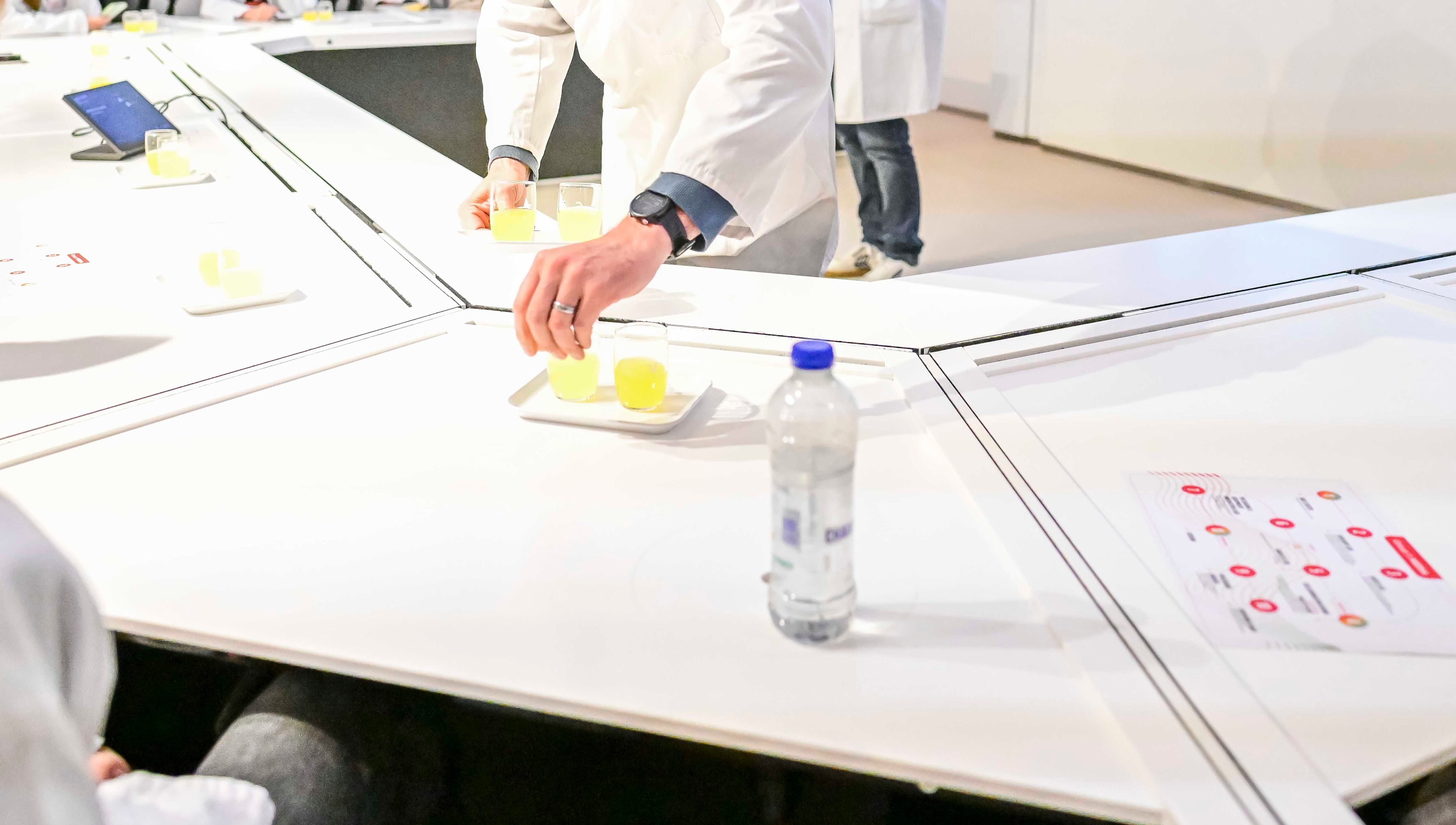 Trialing an orange beverage in the sensory room