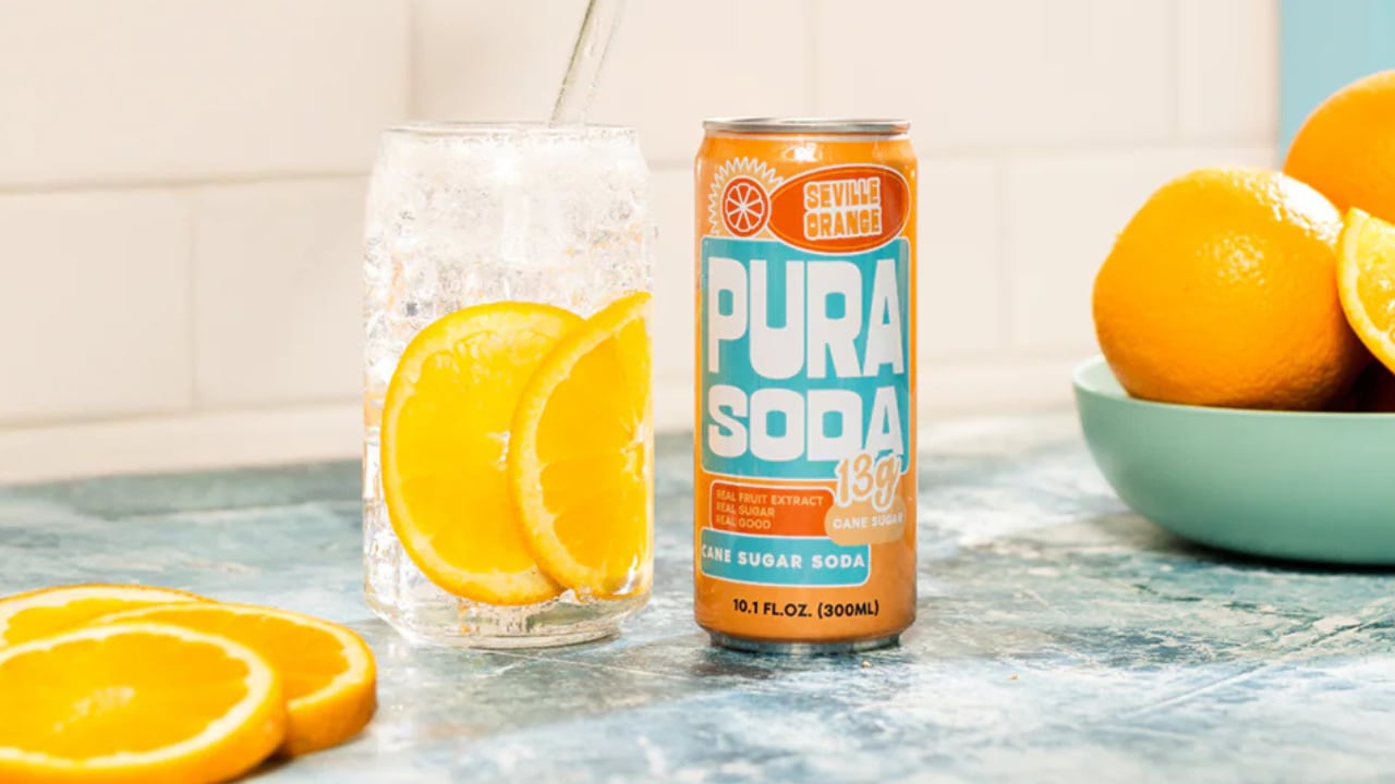 Pura Soda is launching Cola as its newest flavor at the show.
