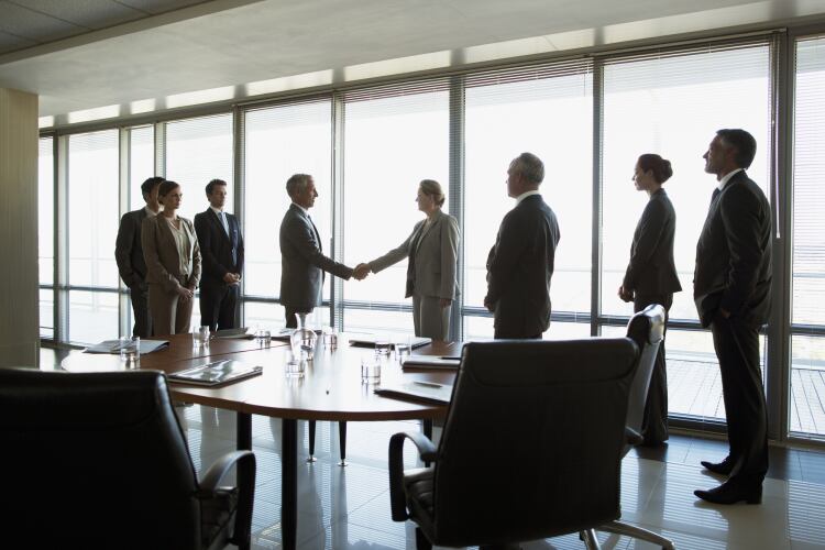 GettyImages-Robert-Daly-corporate-boardroom-business-deal.png