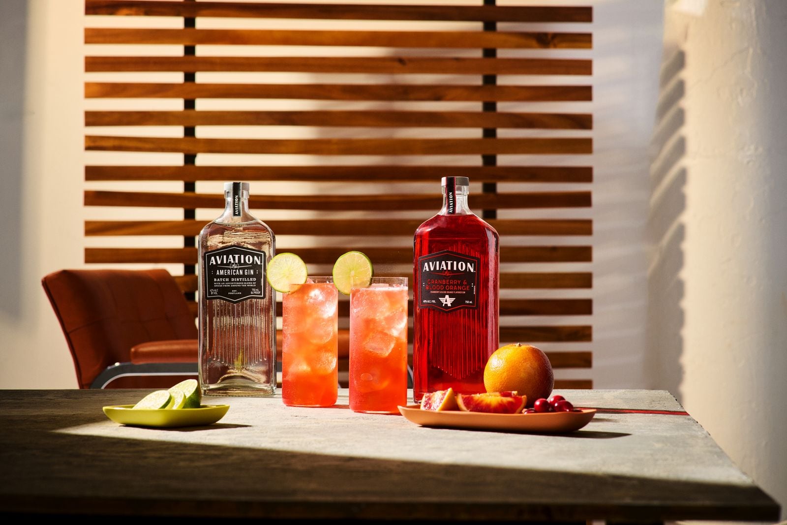 Bottle of Aviation Cranberry & Blood Orange gin highlighting the new flavour.