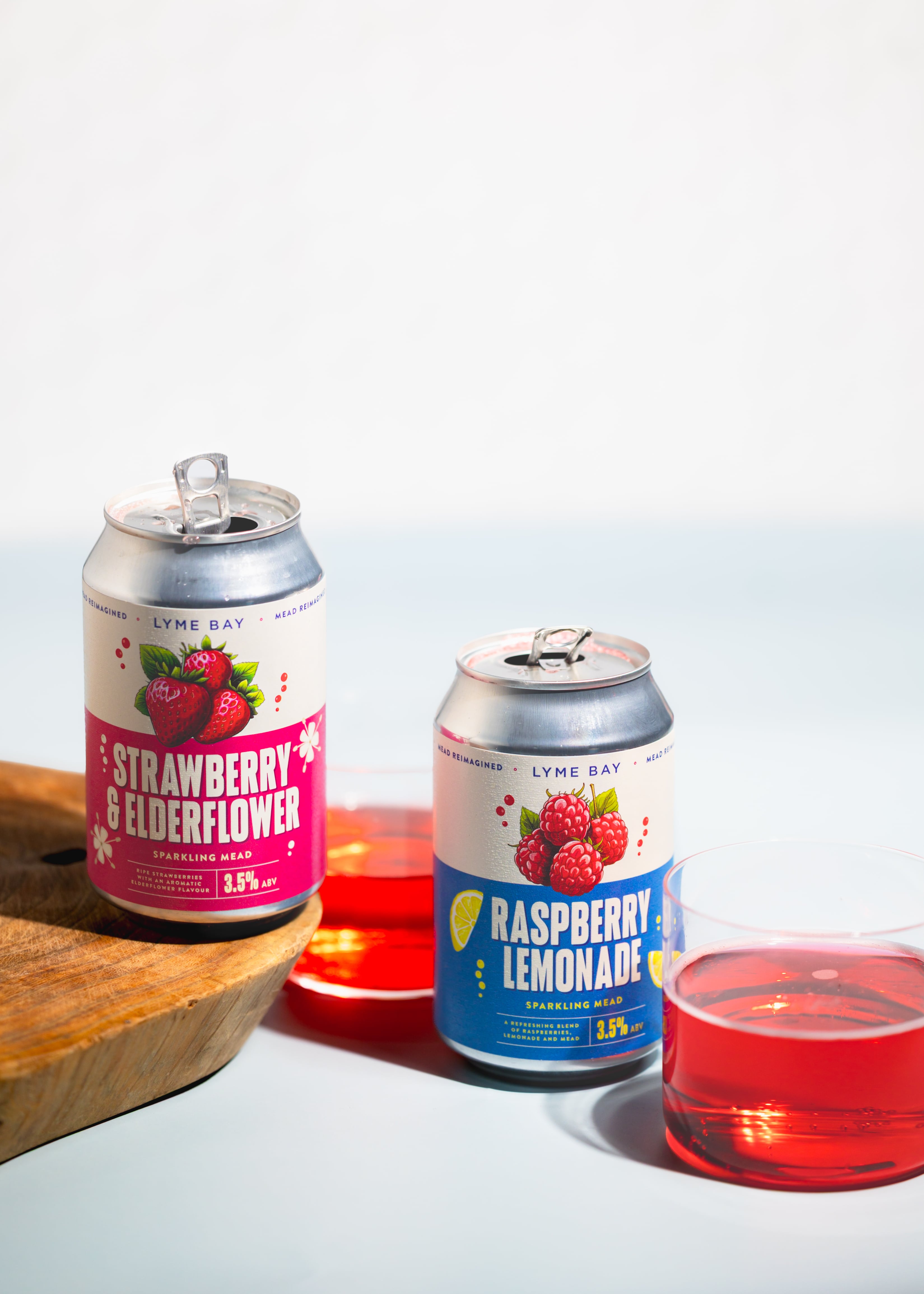 Cans of Lyme Bay Raspberry Lemonade and Strawberry & Elderflower sparkling meads.