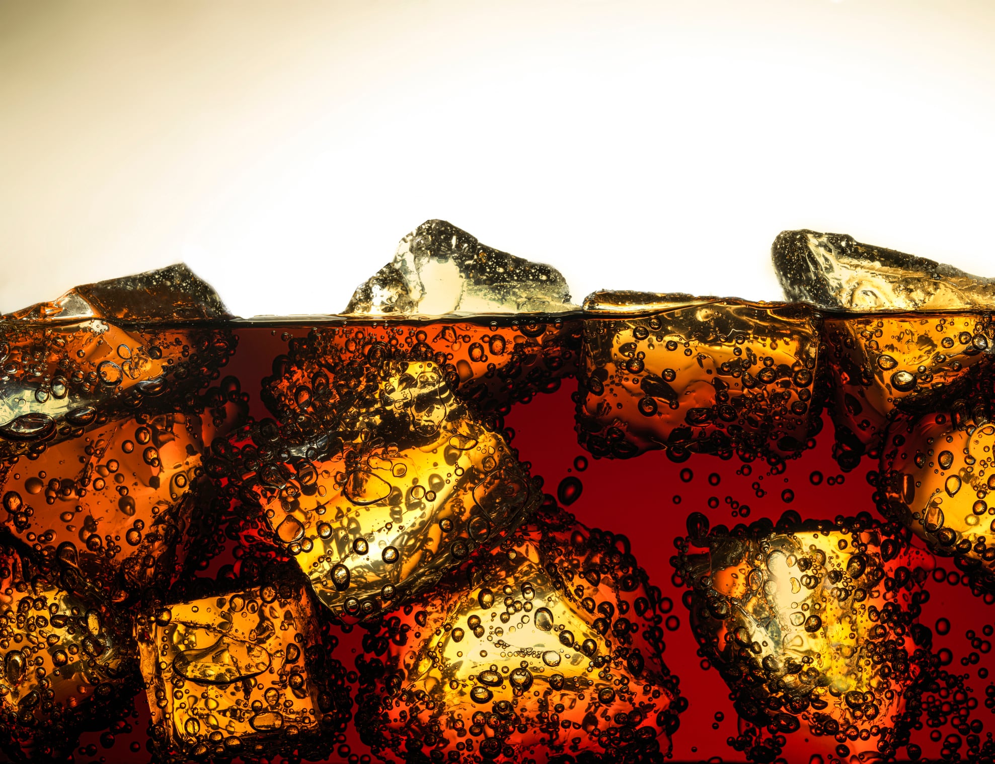 Ice cubes in bubbly soda