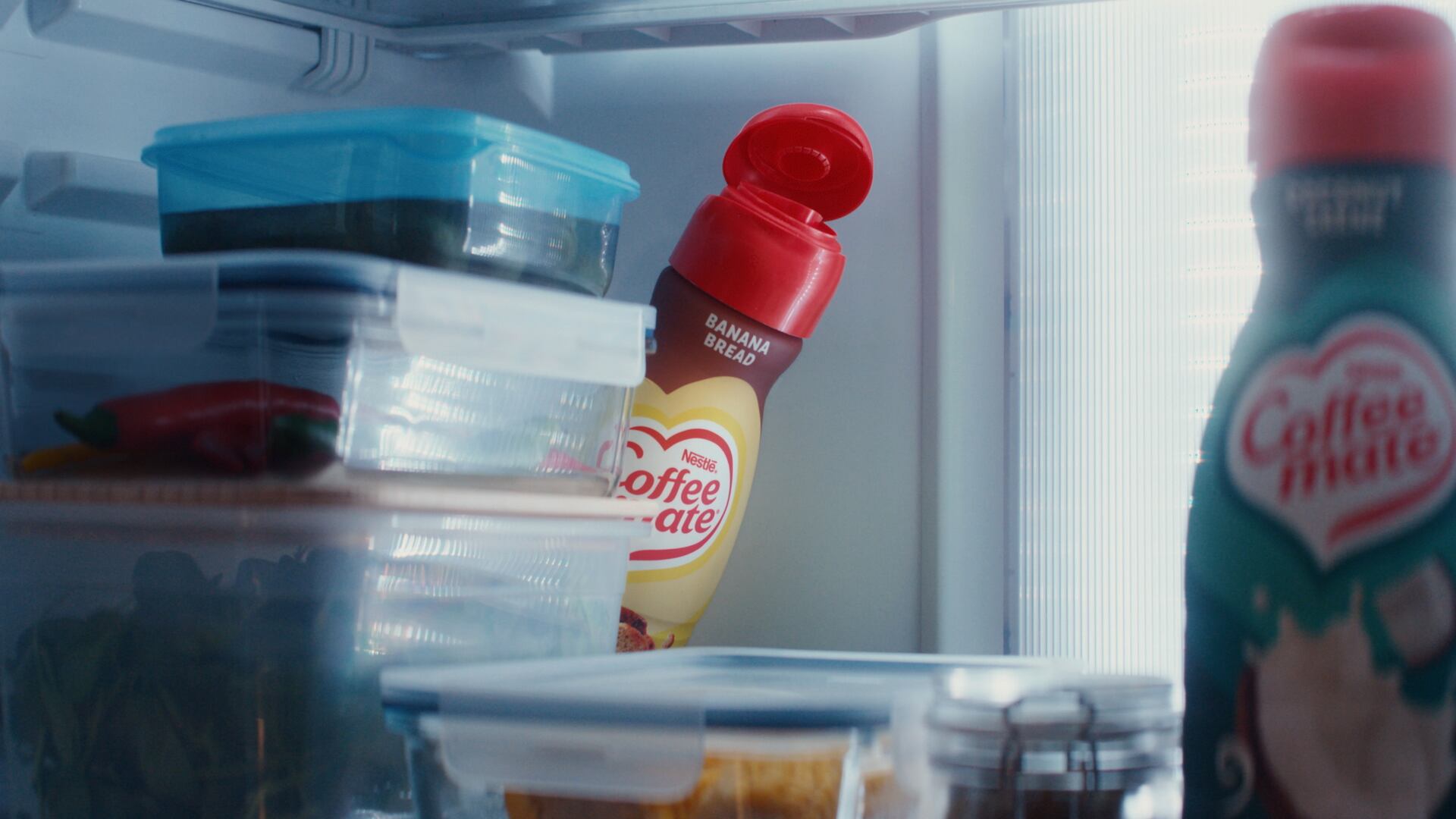 The brand's new "Pour It On" marketing campaign leans into pop music, humor and anthropomorphic Coffee mate bottles.