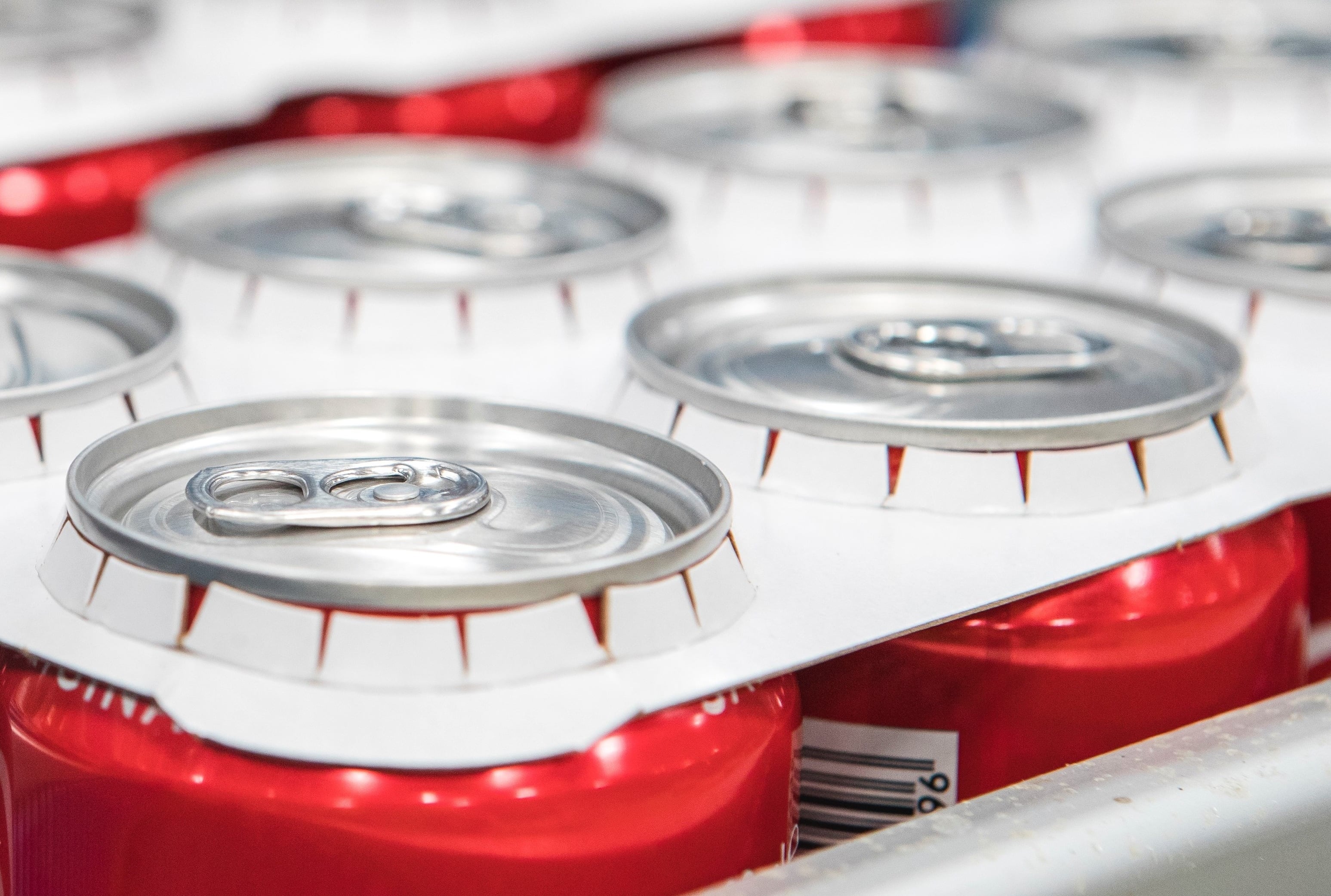 Coca-Cola introduces recyclable paperboard-based rings on can multipacks