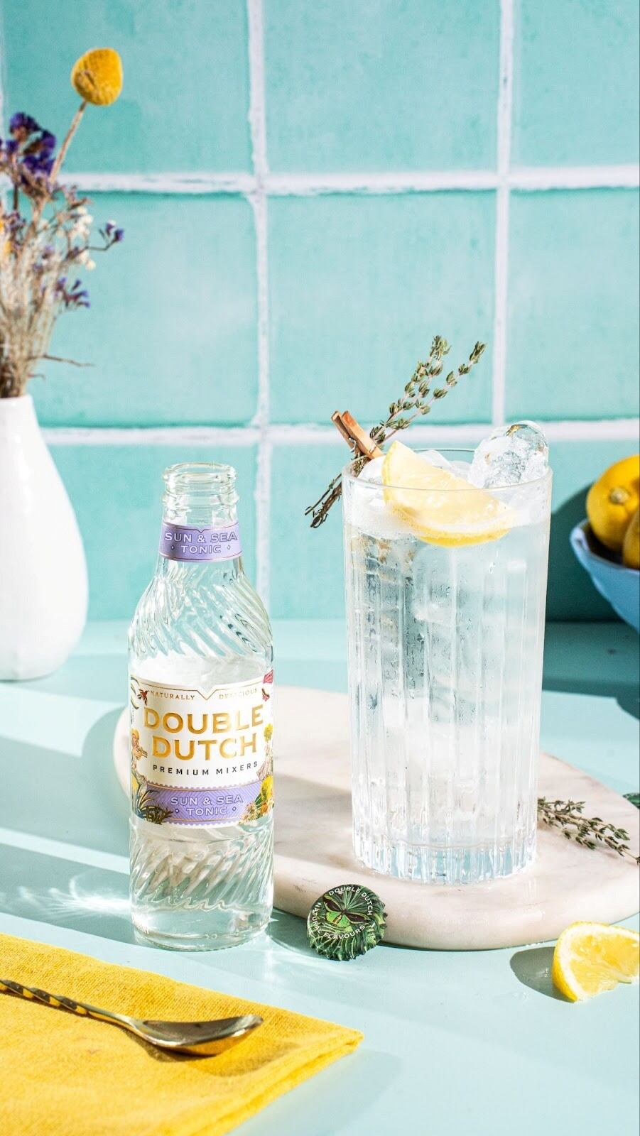 Bottle of Double Dutch Sun & Sea tonic water with herbs and citrus.