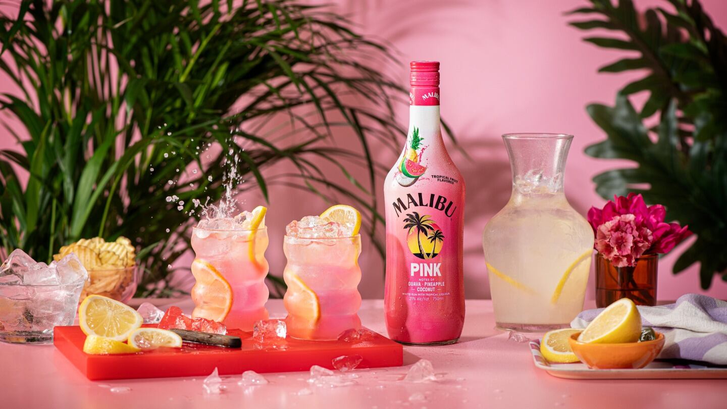 Malibu Pink bottle and Malibu & Dole RTD cans in four tropical flavours.