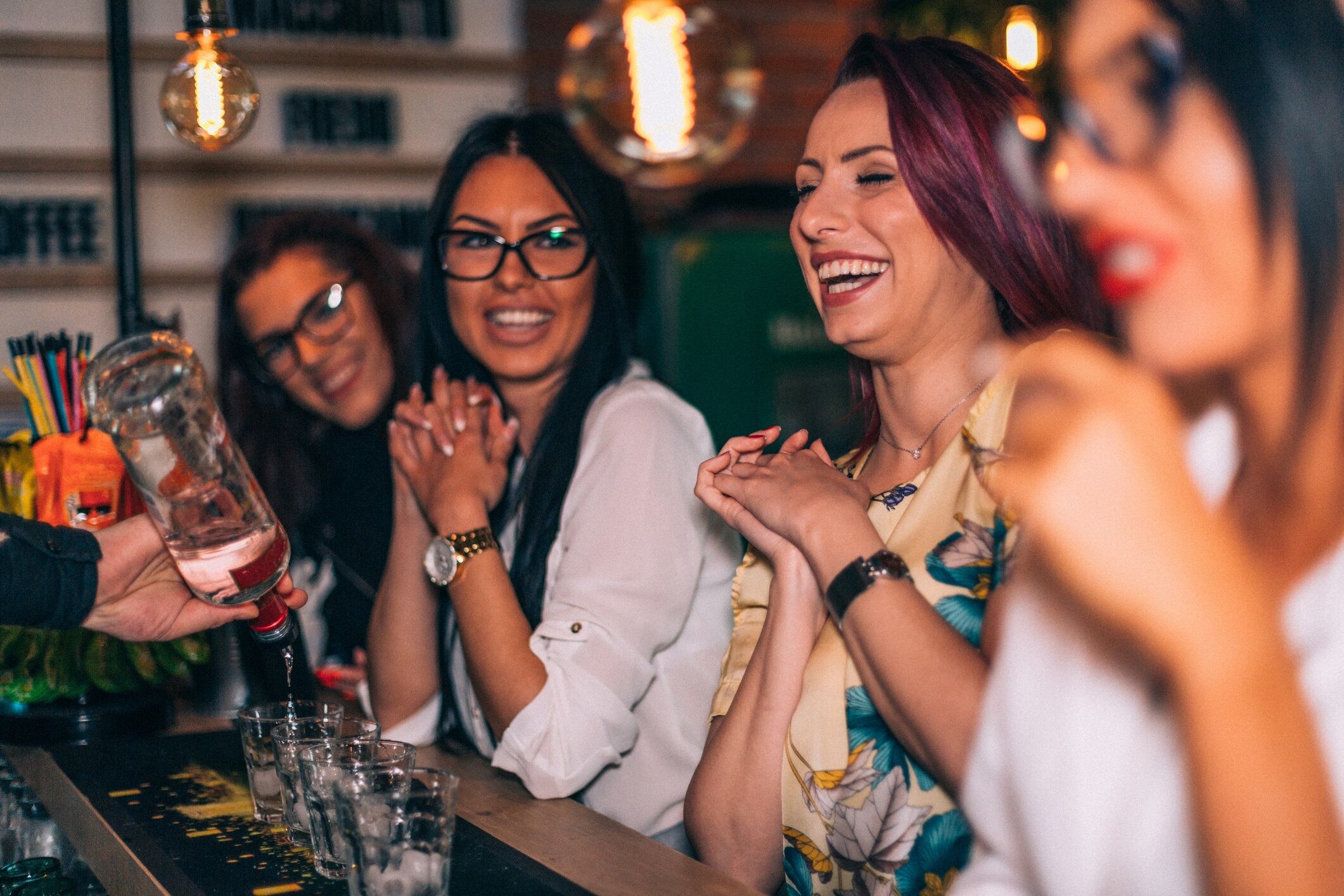 Friends enjoying a party at the bar