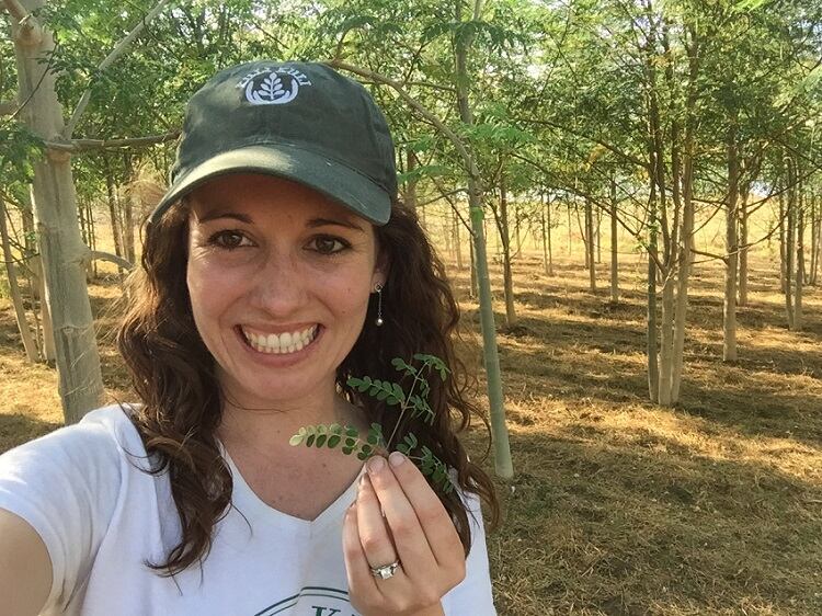 Lisa-in-Nicaragua-eating-moringa.jpg