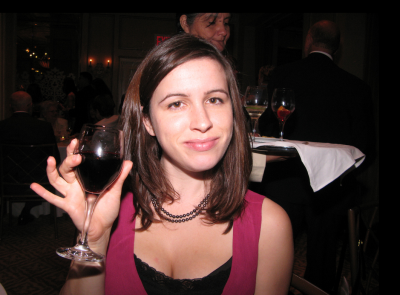 This woman is enjoying a glass of red wine in New York, but could prices rise as a result of controversial legislation? (Picture: Jack/Flickr)
