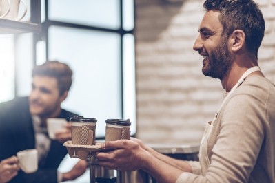 While the convenience of on-the-go food and drink options is on the rise, stopping by a coffee shop to buy coffee is still an essential part of the day for Americans, Mintel finds. ©GettyImages/g-stockstudio