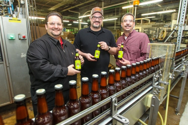 Sealing the deal at The Saint Louis Brewery (l-r): Clint Gawart, Ardagh; Jeremy Balko, Schlafly Beer; and Ron Laiben, Ardagh.