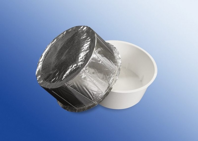 The finished multi-barrier plastic packaging (right) and the inside barrier foil (left)