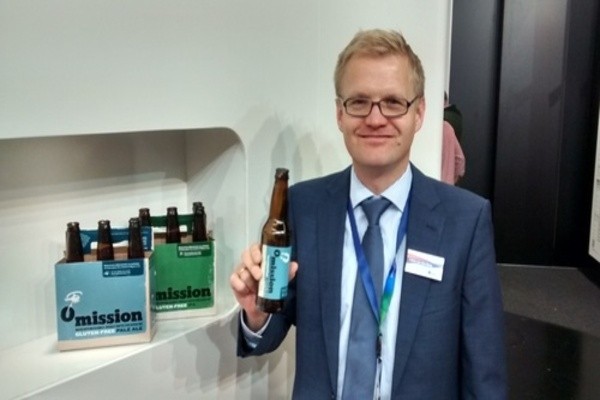 Fokke van den Berg from DSM Food Specialties, pictured with Omission, a Portland Oregon craft beer brewed to be gluten free
