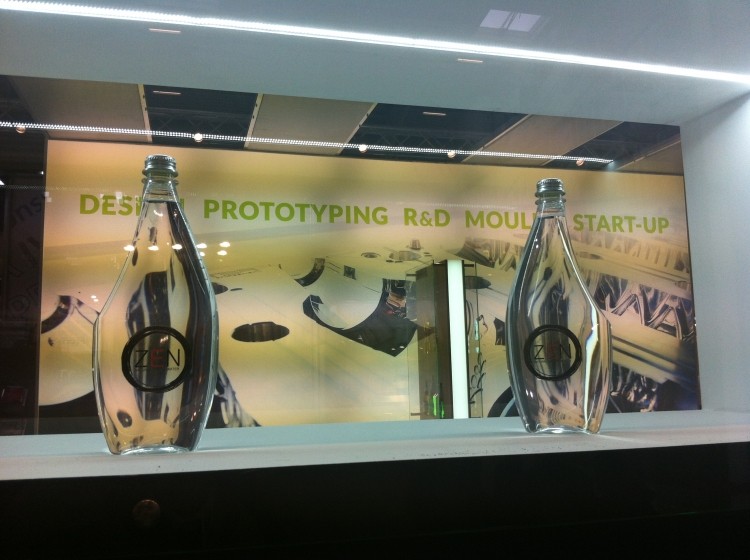 PET bottles designed to look like glass, at the P.E.T Engineering stand at DrinkTec 2013