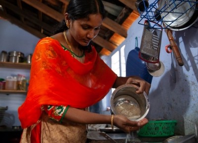 A woman uses clean water to prepare food in Kerala, India, which is having its worst water crisis in the country’s history. Photo Credit: WaterAid/Ashima Narain
